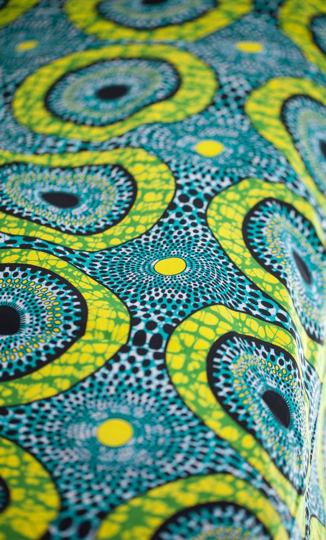 copriletto lime realizzato con stoffa wax in cotone originaria della Tanzania scatto 1